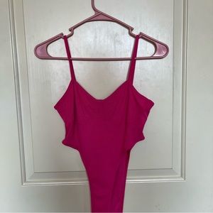 Pink body suit